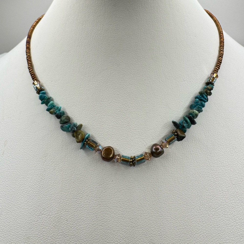 Elegant Beaded Necklace with Turquoise and Copper Accents